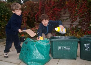 Contractor Amey collects paper and card and plastic and cans in separate containers